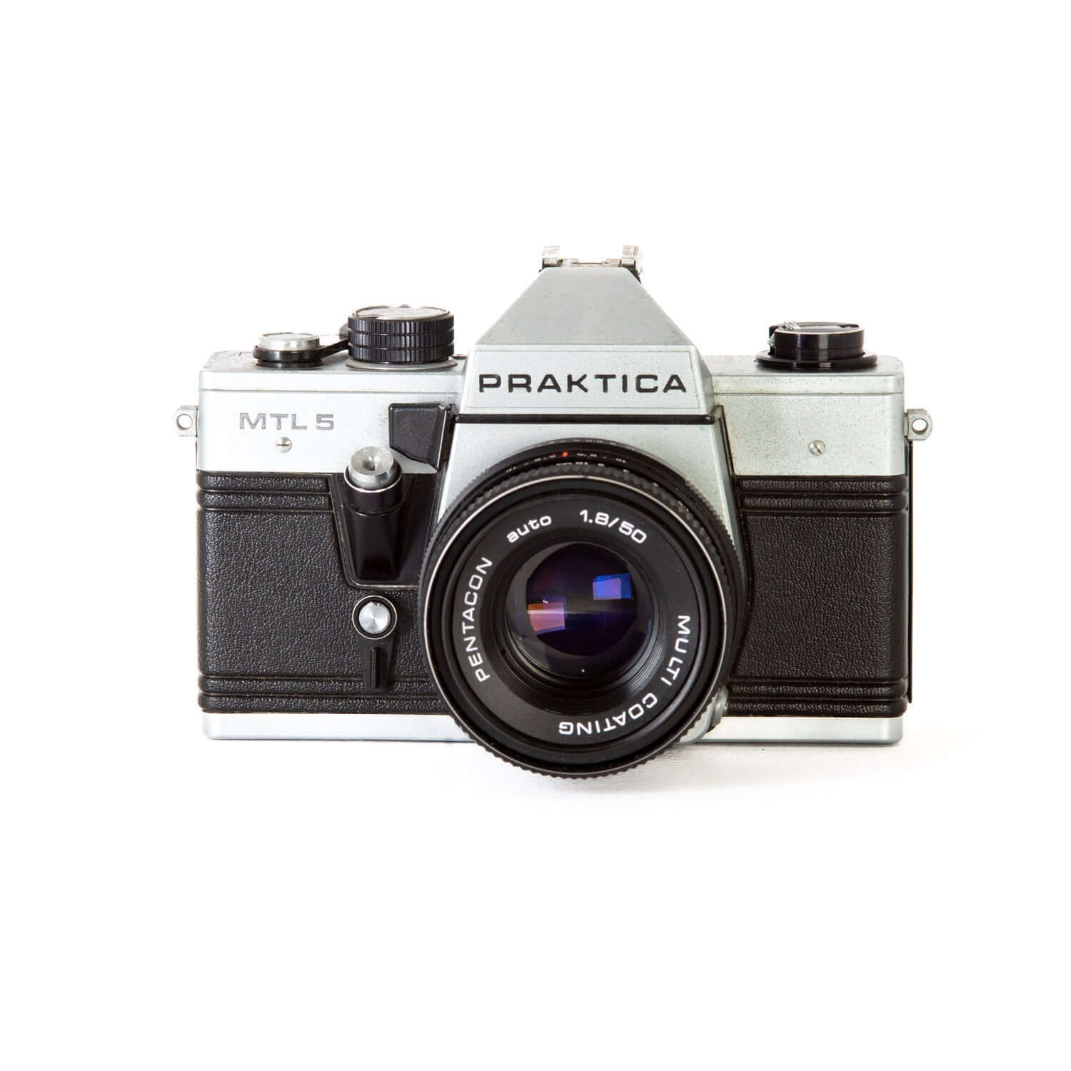 A man holds the single-lens reflex camera Praktica MTL 5 in his hands